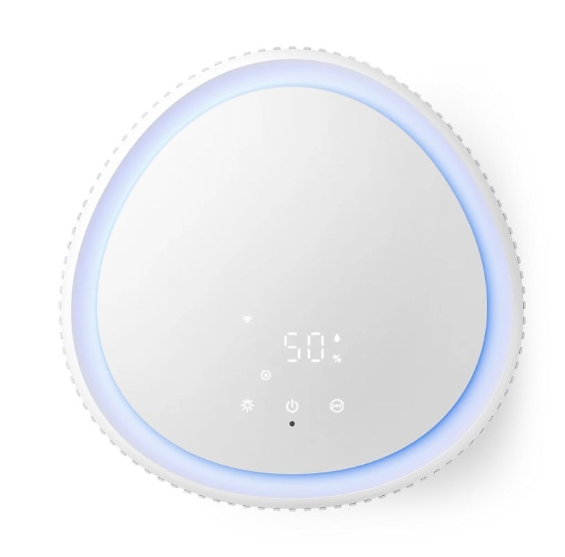 Taghareed Philips PureProtect Water 3400 Series air purifier and humidifier with digital display showing 50% humidity.