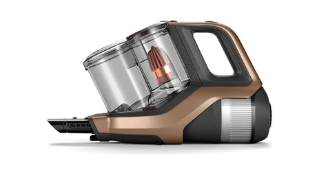 Taghareed Philips SpeedPro Max stick vacuum cleaner in bronze and black with a clear dustbin and digital display.