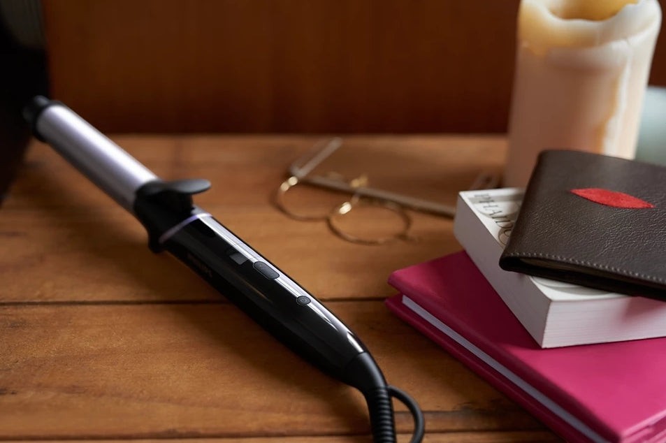 Taghareed Philips StyleCare 25mm tourmaline ceramic curler with digital temperature settings and swivel cord.