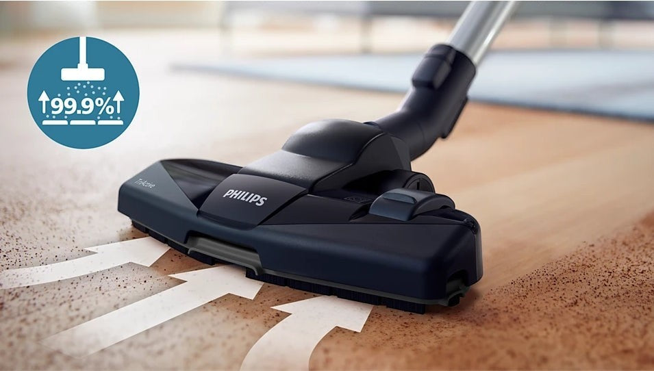 Taghareed Philips 5000 Series bagless vacuum cleaner with TriActive nozzle, captures 99.9% of fine dust.