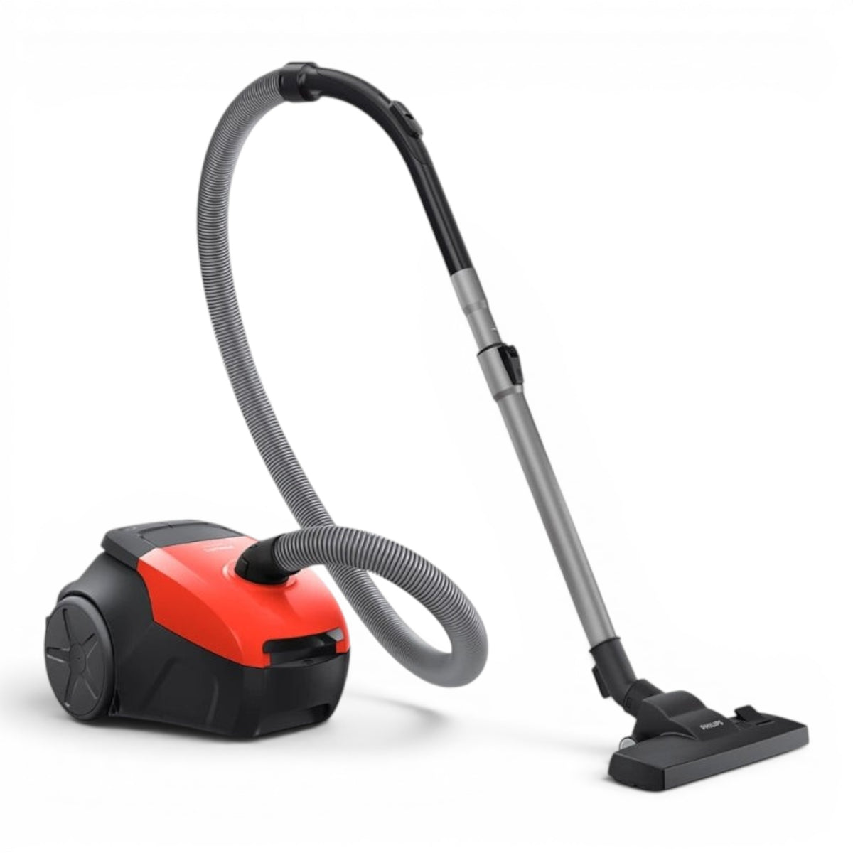Taghareed Philips 2000 Series bagged vacuum cleaner in red and black with HEPA filter and 3L bag capacity.